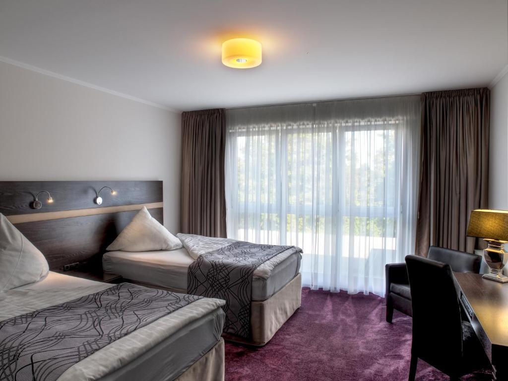 Sporthotel Racket Inn هامبورغ الغرفة الصورة